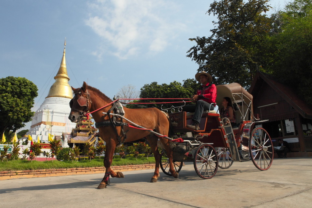 Horse drawn carriages at Phra Kaeo Don Tao Suchadaram Temple, Lampang